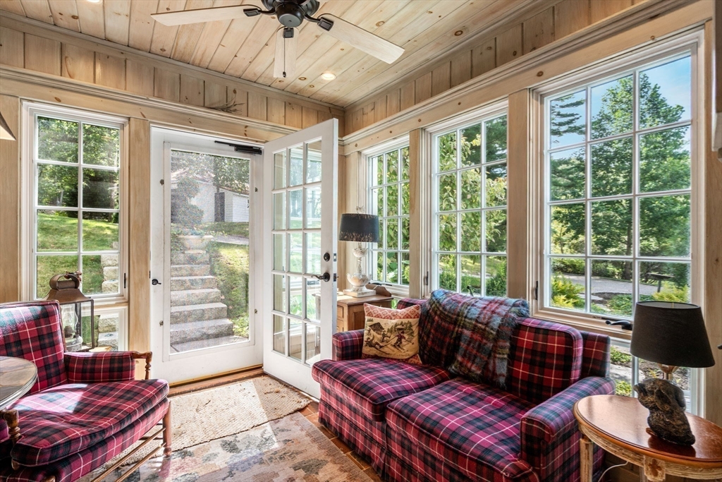 157 Centre Street Dover, MA 02030 - Photo 30 of 42 a living room with furniture and a window