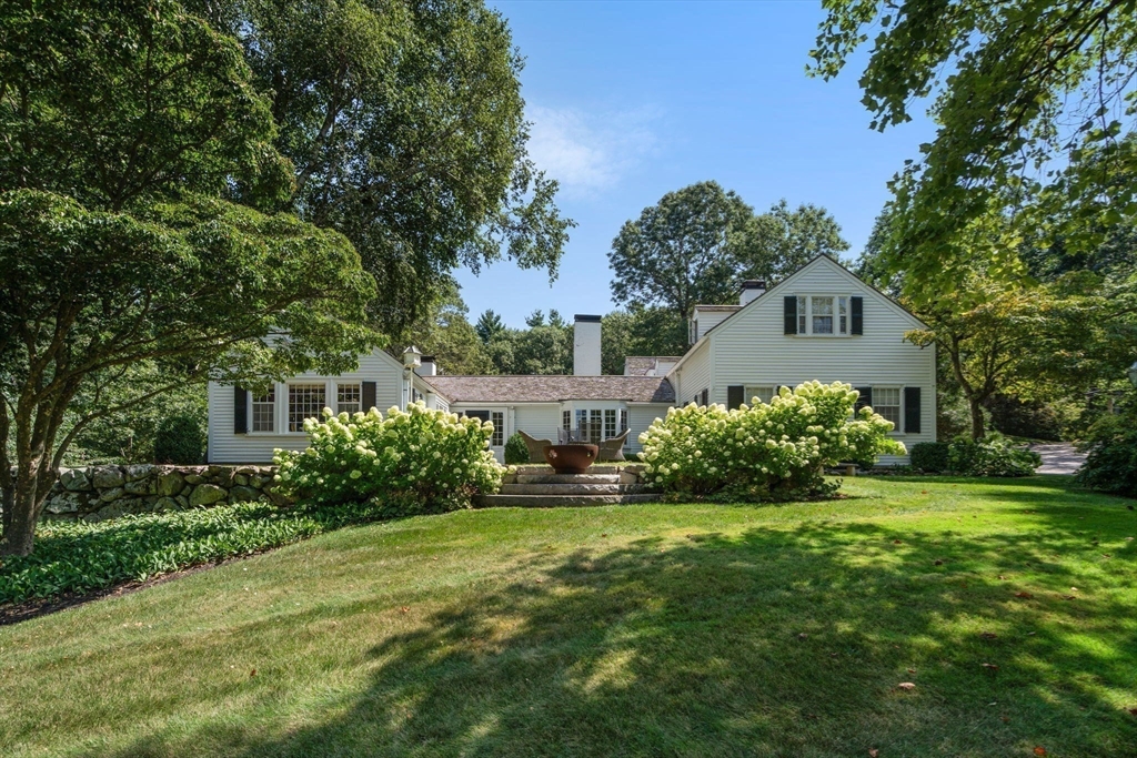 157 Centre Street Dover, MA 02030 - Photo 32 of 42 a front view of a house with a yard