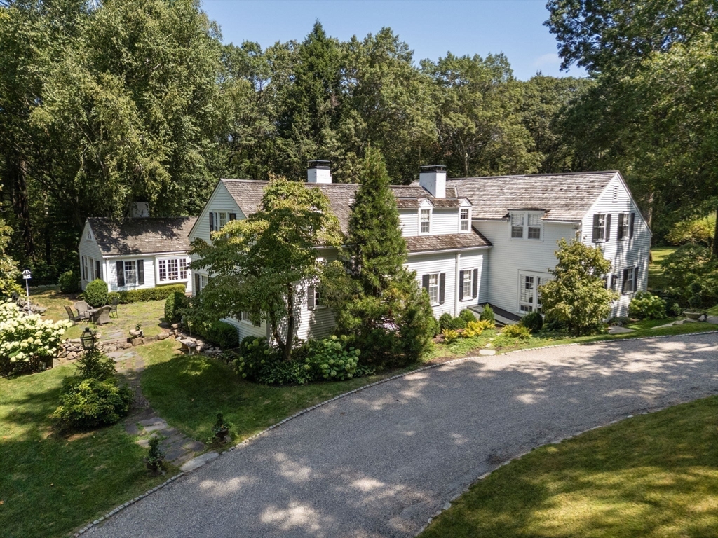 157 Centre Street Dover, MA 02030 - Photo 38 of 42 a aerial view of a house with a yard and large trees