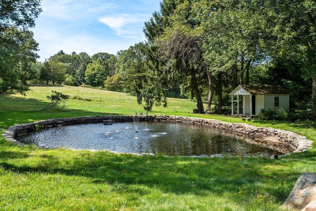 157 Centre Street Dover, MA 02030 - Photo 40 of 42 a view of a house with a yard