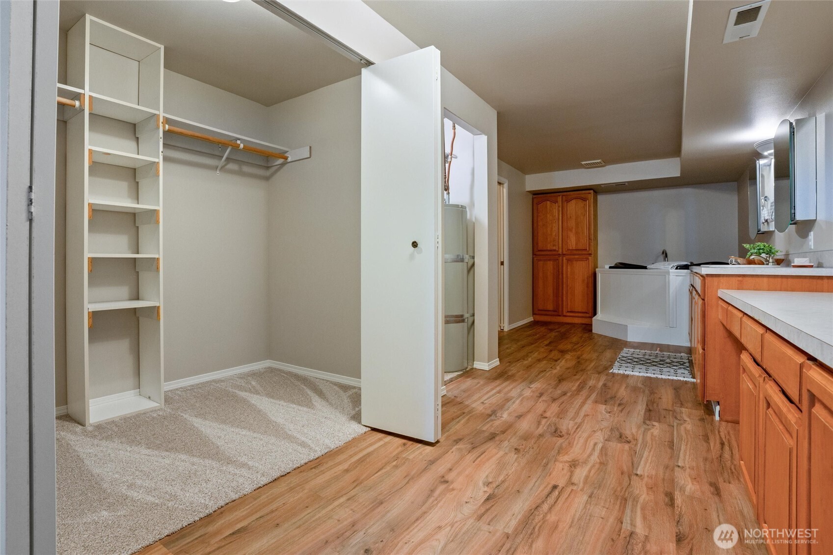 5735 Southeast Alpine Road Olalla, WA 98359 - Photo 19 of 40 a view of a kitchen with wooden floor and a sink