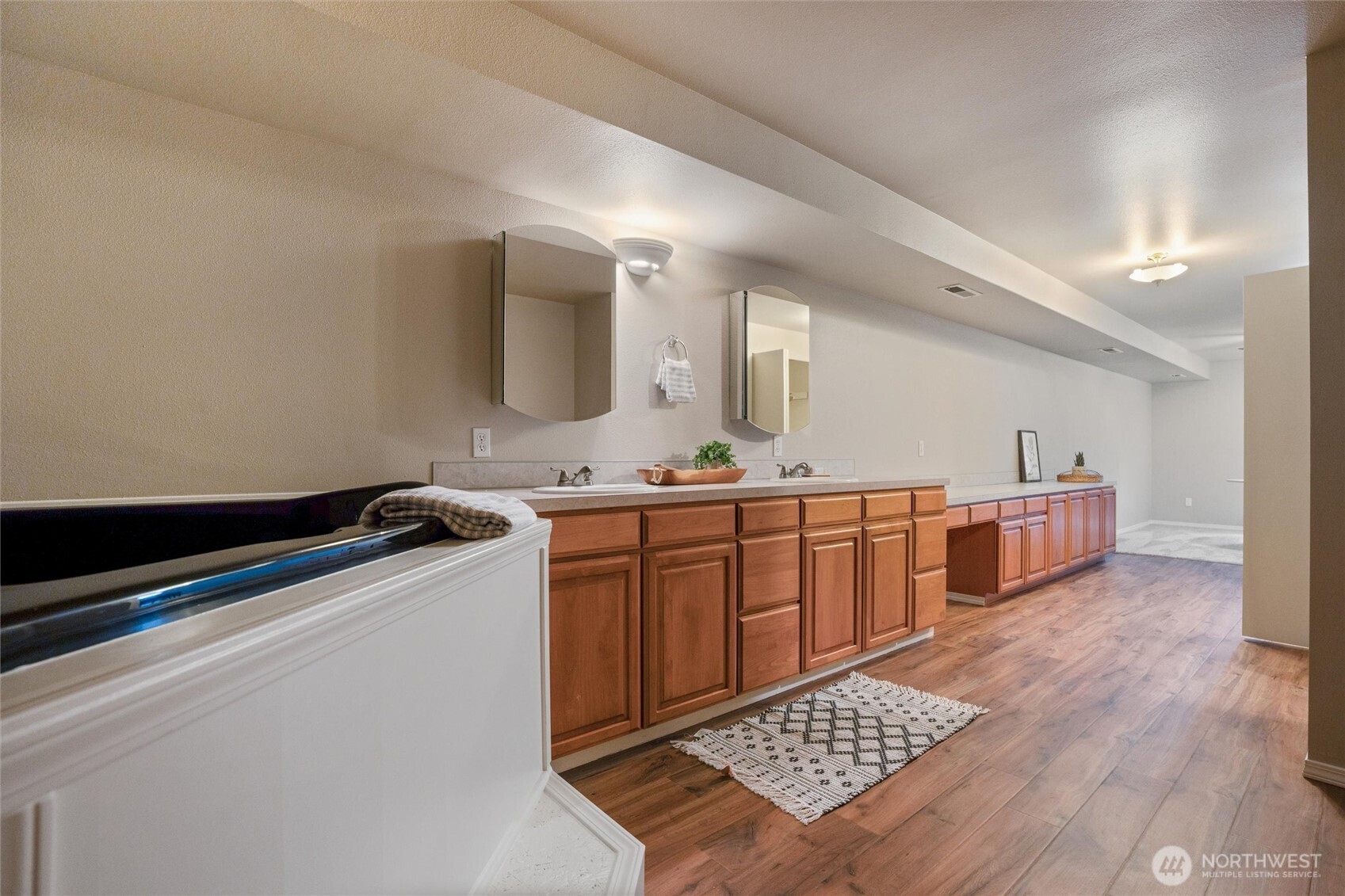 5735 Southeast Alpine Road Olalla, WA 98359 - Photo 21 of 40 a kitchen with stainless steel appliances a sink and a stove top oven
