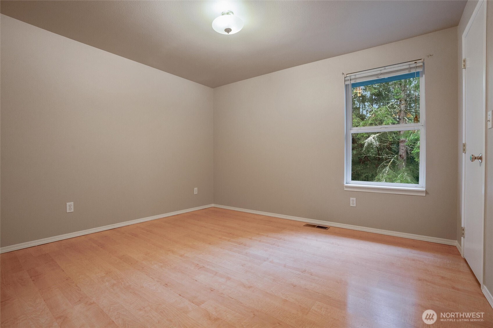 5735 Southeast Alpine Road Olalla, WA 98359 - Photo 25 of 40 an empty room with a window