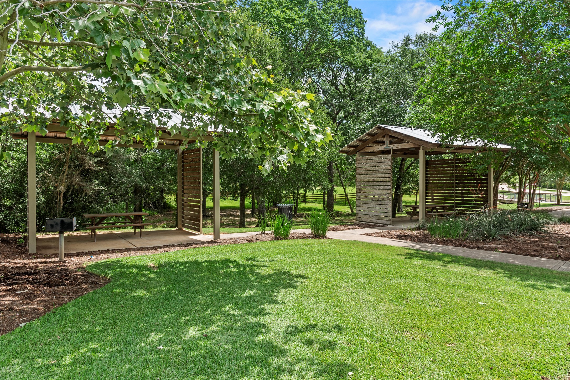 29419 Cir S Rnch Trail Fulshear, TX 77406 - Photo 43 of 45 Gather with neighbors, enjoy a shaded picnic, or fire up the grill at one of Fulshear Run’s outdoor gathering spaces. Thoughtfully designed community amenities like this create even more opportunities to relax and enjoy the neighborhood.