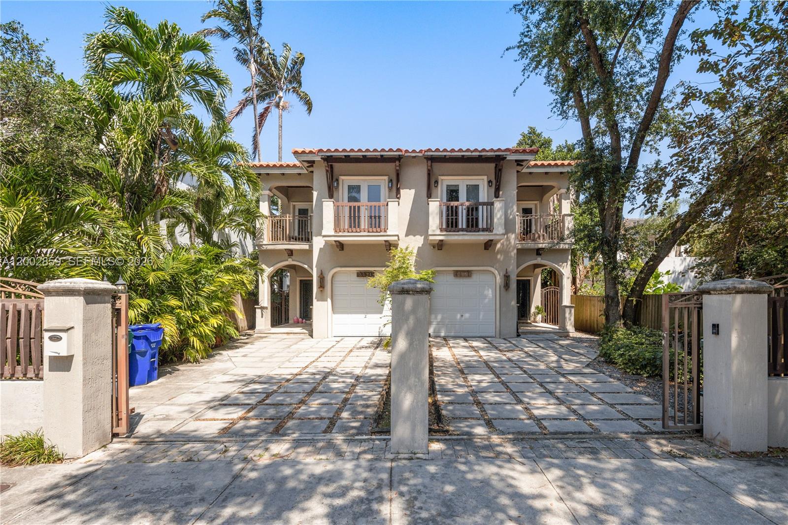 3171 Indiana Street, Unit 3171 Miami, FL 33133 - Photo 1 of 14 a front view of a house with a porch