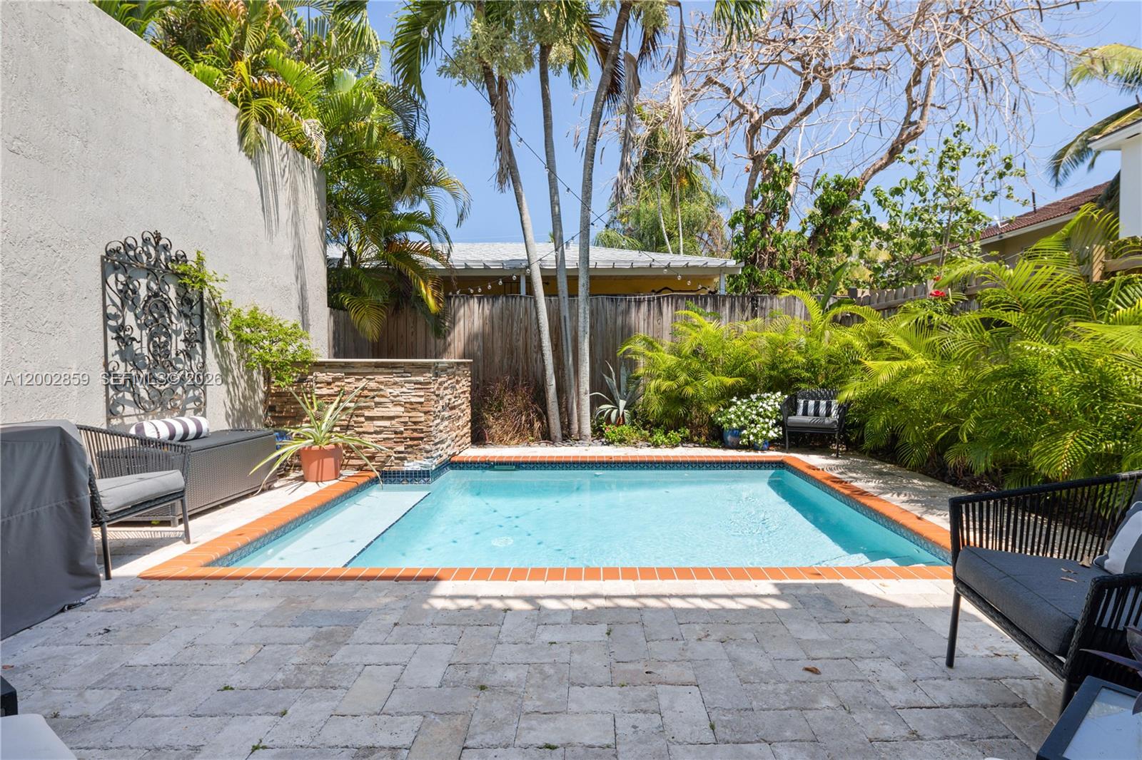 3171 Indiana Street, Unit 3171 Miami, FL 33133 - Photo 11 of 14 a view of swimming pool with patio