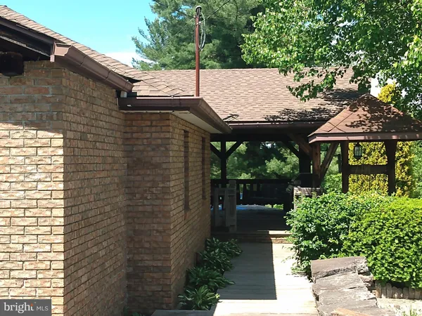 a view of house with garden