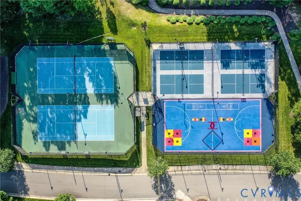 a view of a swimming pool with an outdoor seating
