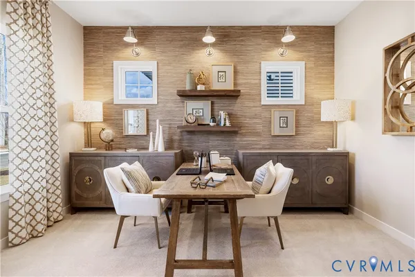 a view of a dining room with furniture and window