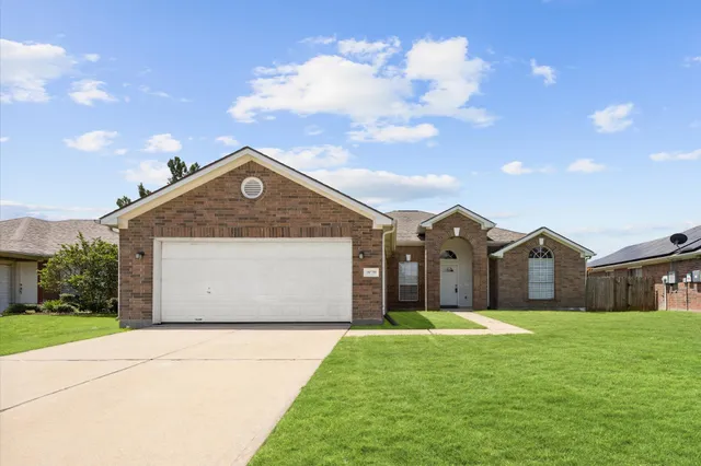 a front view of house with yard