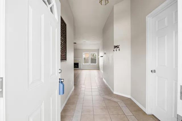 a hallway with white doors