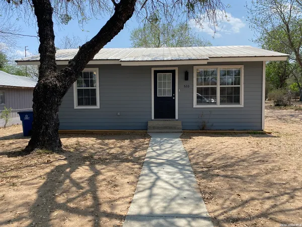 a house view with a outdoor space