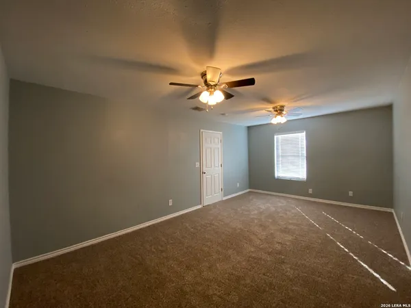 en view of an empty room with a window