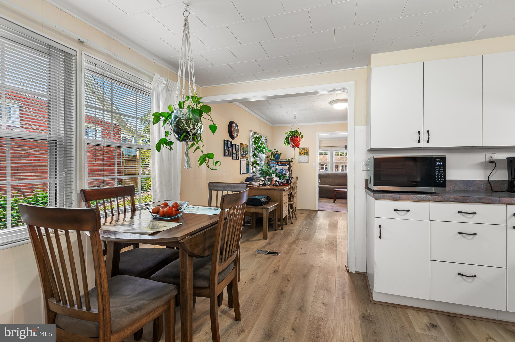 111 Compass Road Baltimore, MD 21220 - Photo 14 of 36 a view of a dining room with furniture window and outside view