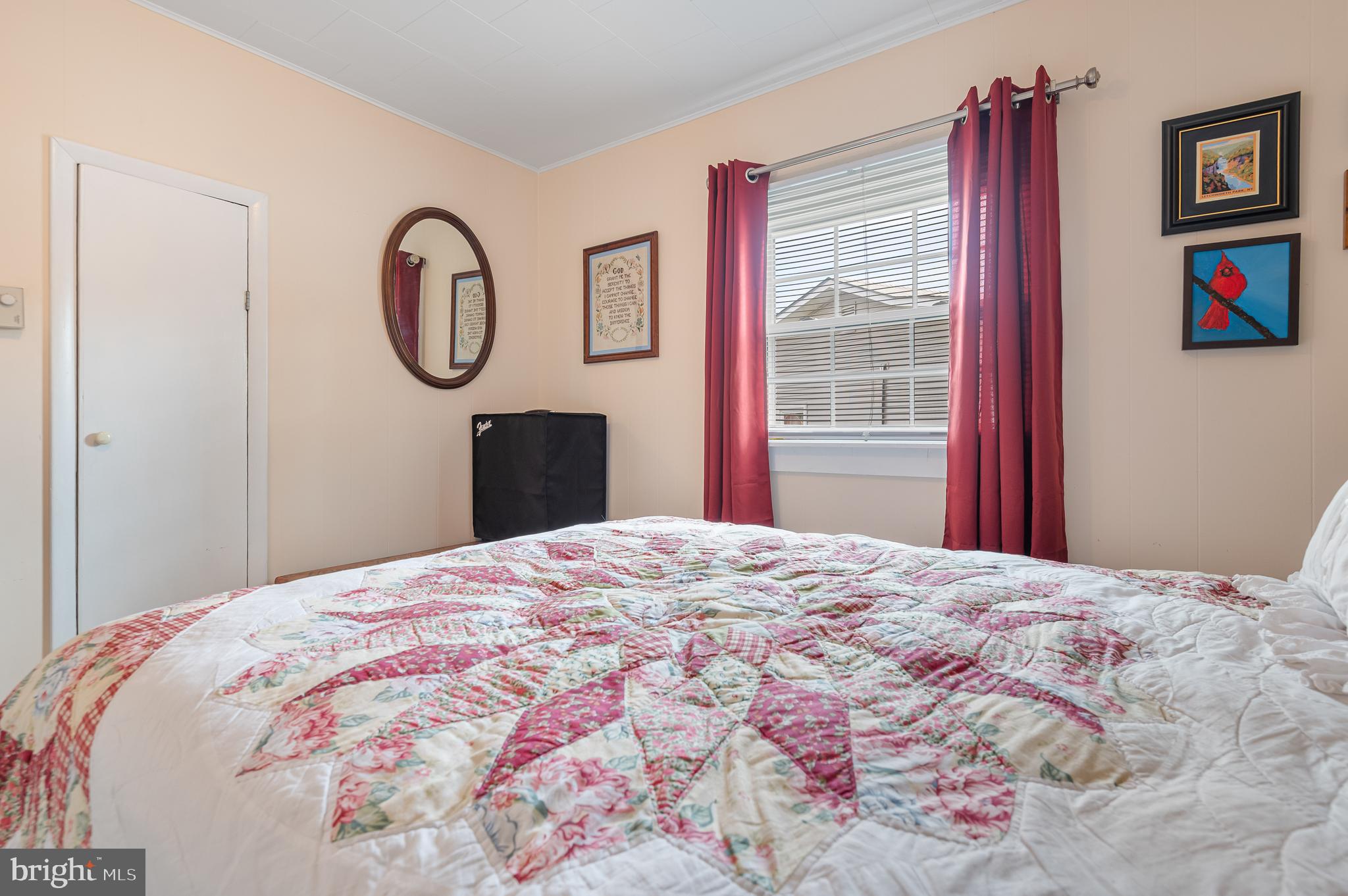 111 Compass Road Baltimore, MD 21220 - Photo 24 of 36 a bedroom with a bed and a dresser