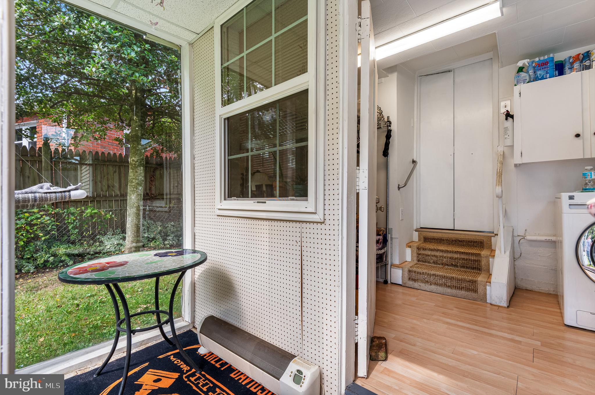 111 Compass Road Baltimore, MD 21220 - Photo 29 of 36 a view of a chairs and table in a patio
