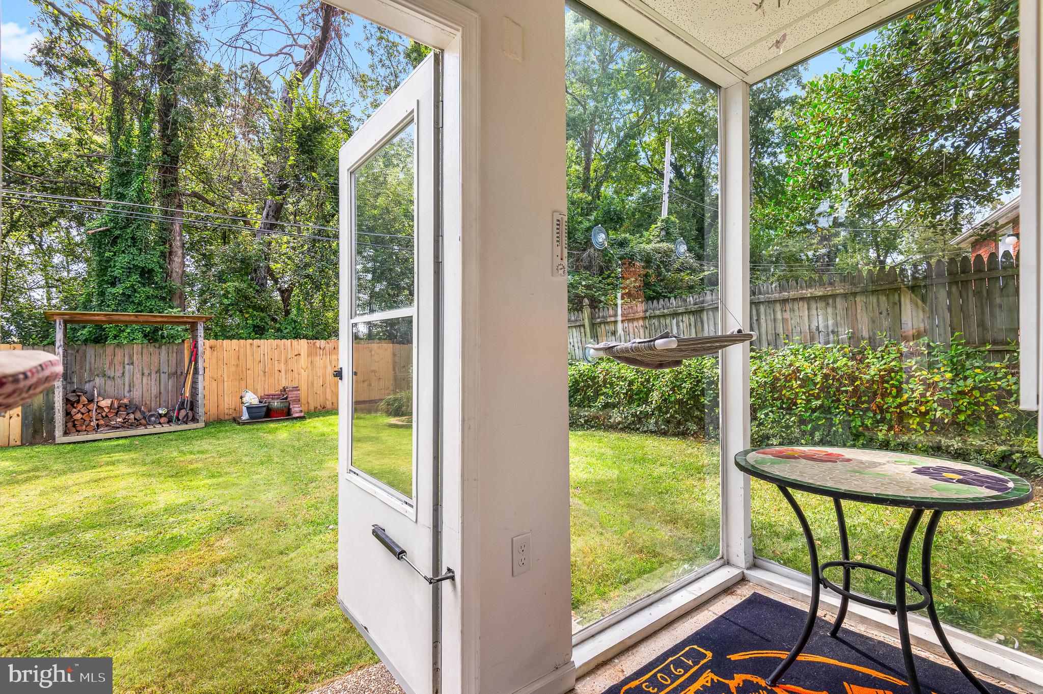 111 Compass Road Baltimore, MD 21220 - Photo 30 of 36 a view of a chairs in backyard of the house