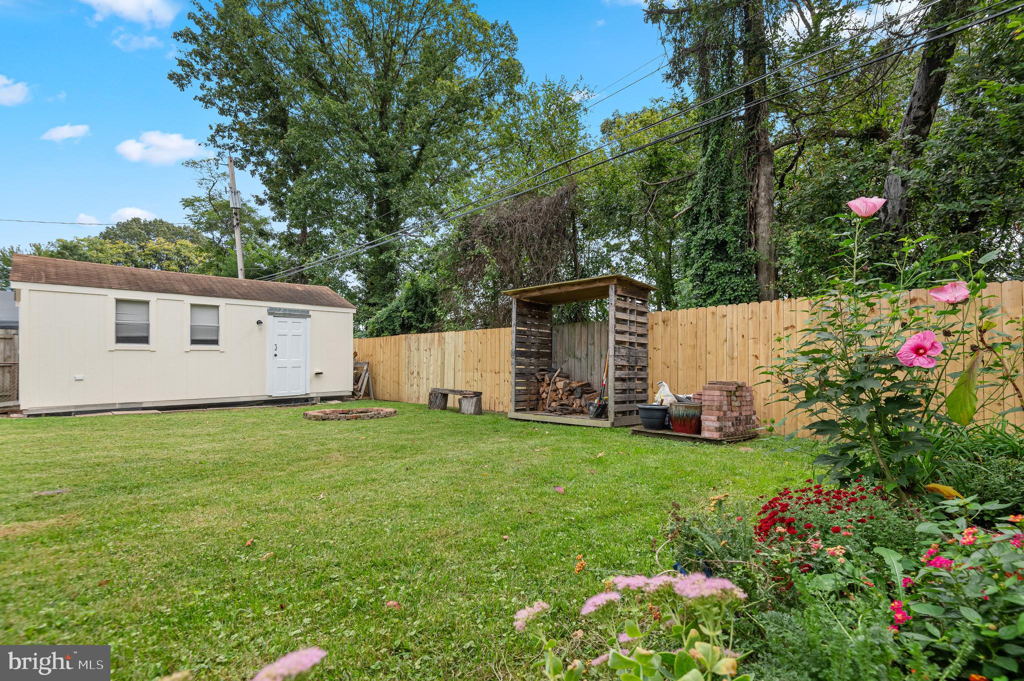 111 Compass Road Baltimore, MD 21220 - Photo 34 of 36 a view of a house with backyard and garden