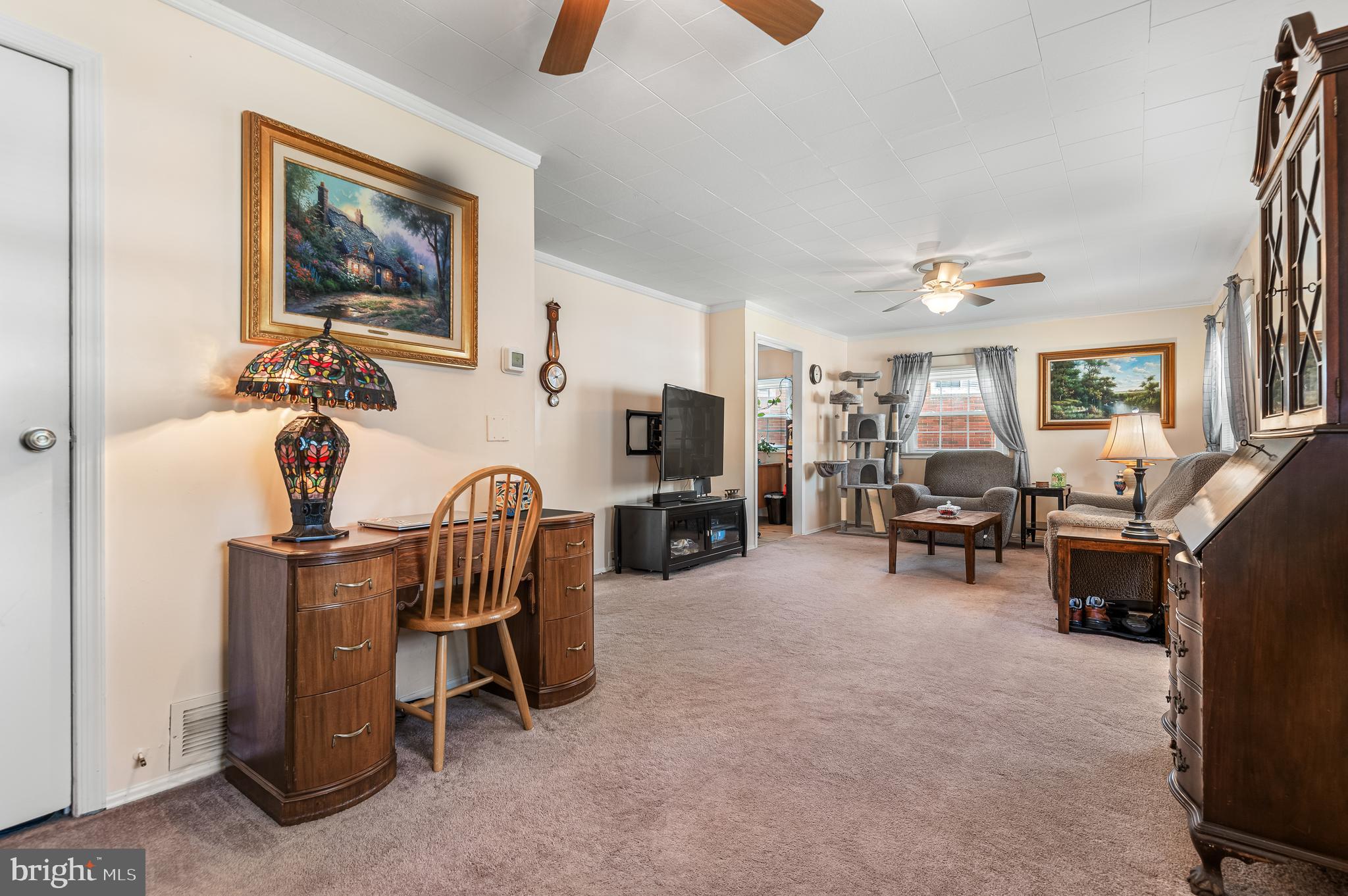 111 Compass Road Baltimore, MD 21220 - Photo 7 of 36 a living room with furniture and a flat screen tv