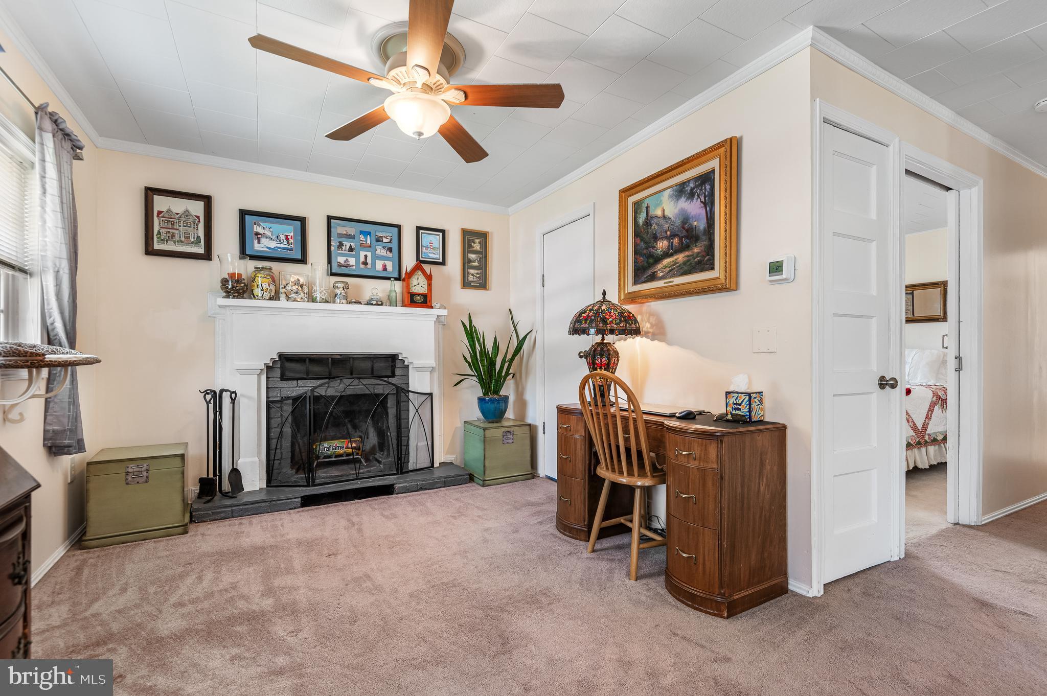 111 Compass Road Baltimore, MD 21220 - Photo 8 of 36 a living room with furniture and a fireplace