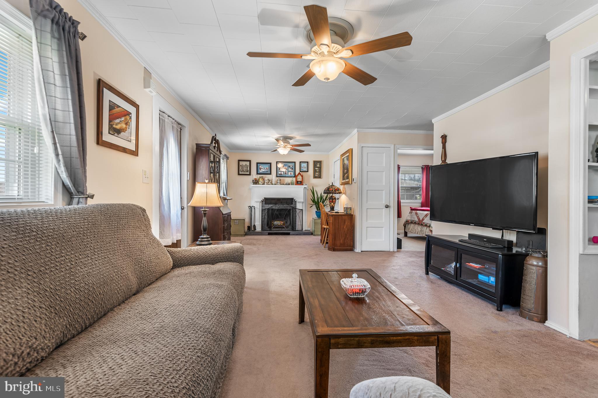 111 Compass Road Baltimore, MD 21220 - Photo 10 of 36 a living room with furniture and a flat screen tv