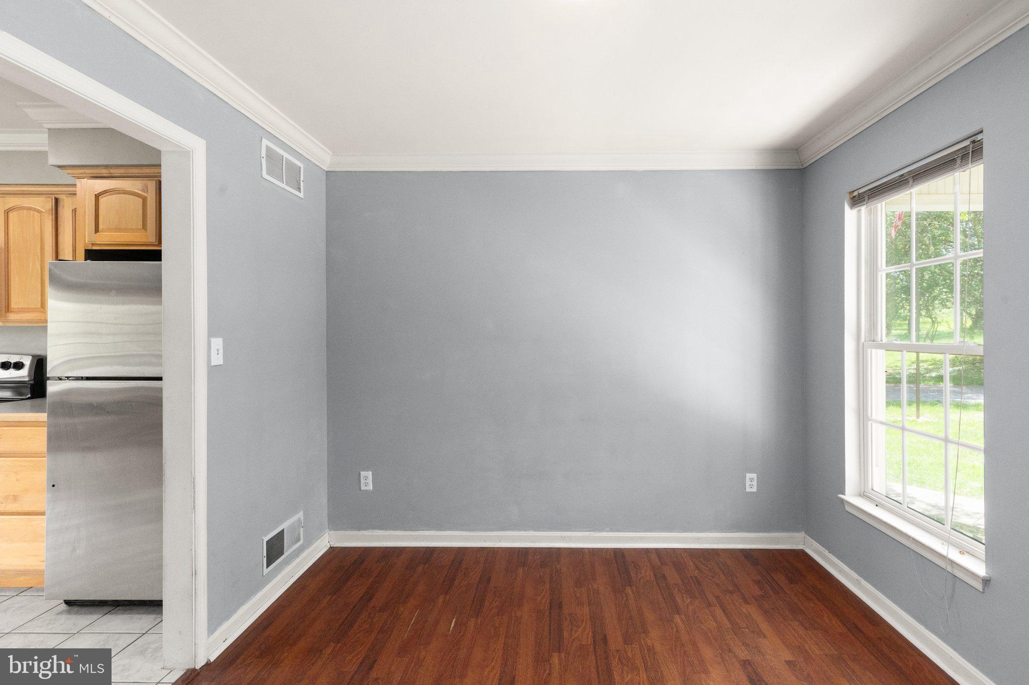 40 Stubb Road Rising Sun, MD 21911 - Photo 4 of 39 a view of a room with wooden floor and windows