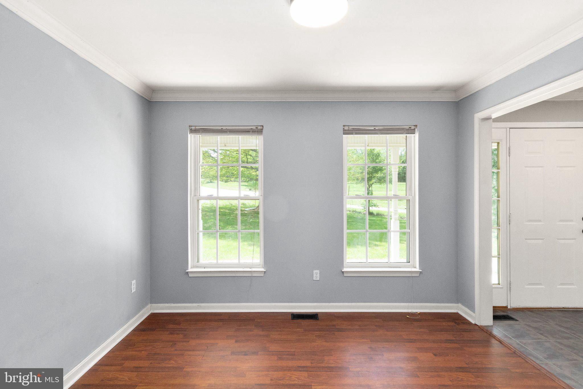 40 Stubb Road Rising Sun, MD 21911 - Photo 5 of 39 an empty room with wooden floor and windows