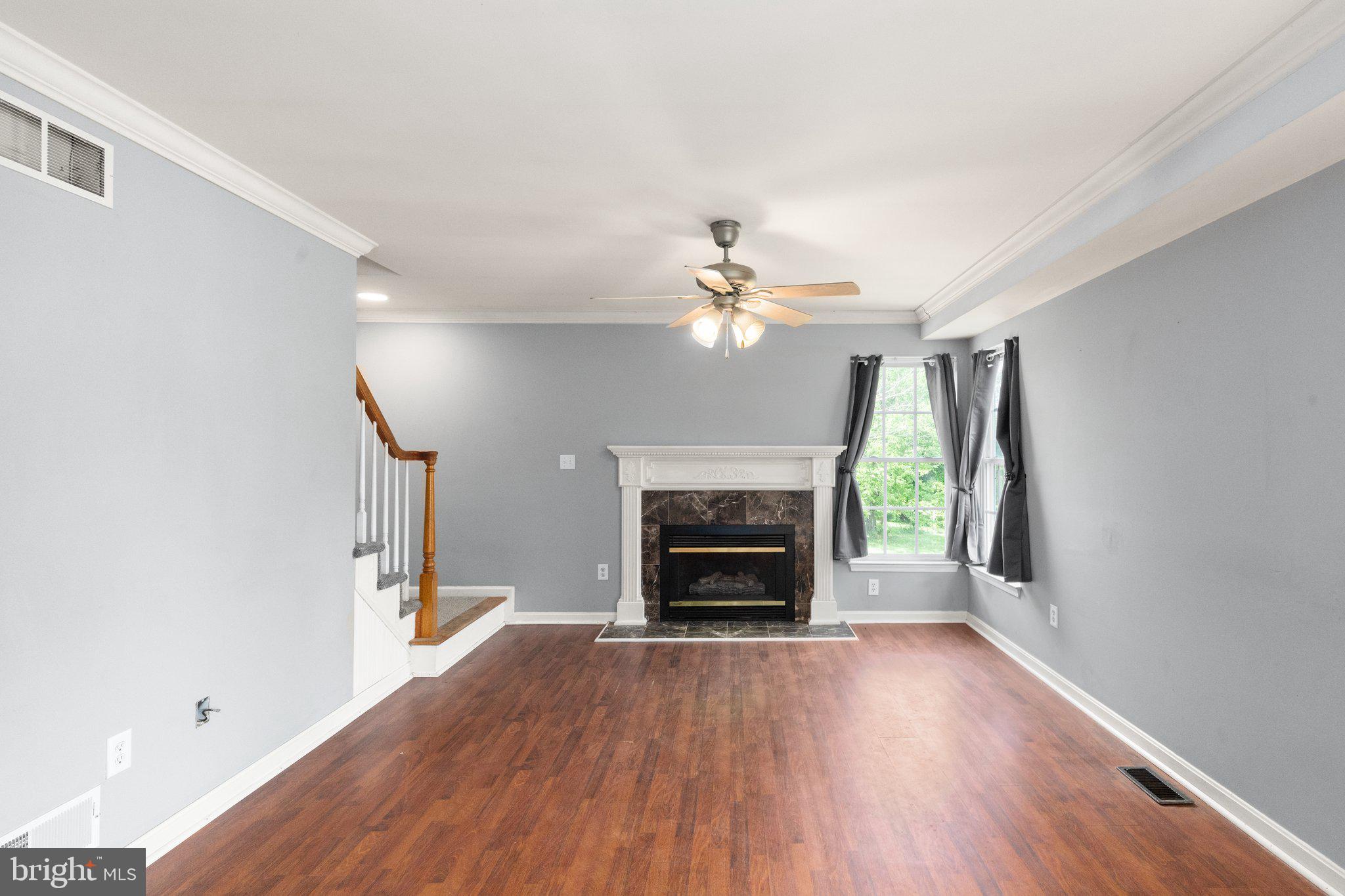 40 Stubb Road Rising Sun, MD 21911 - Photo 9 of 39 a view of empty room with fireplace and wooden floor
