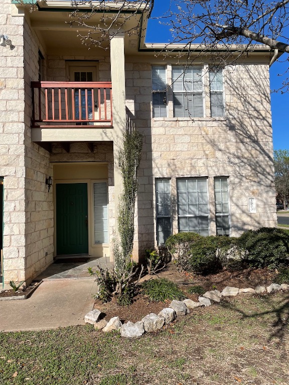 5000 Cleves Street Round Rock, TX 78681 - Photo 3 of 25 a front view of a house with garden