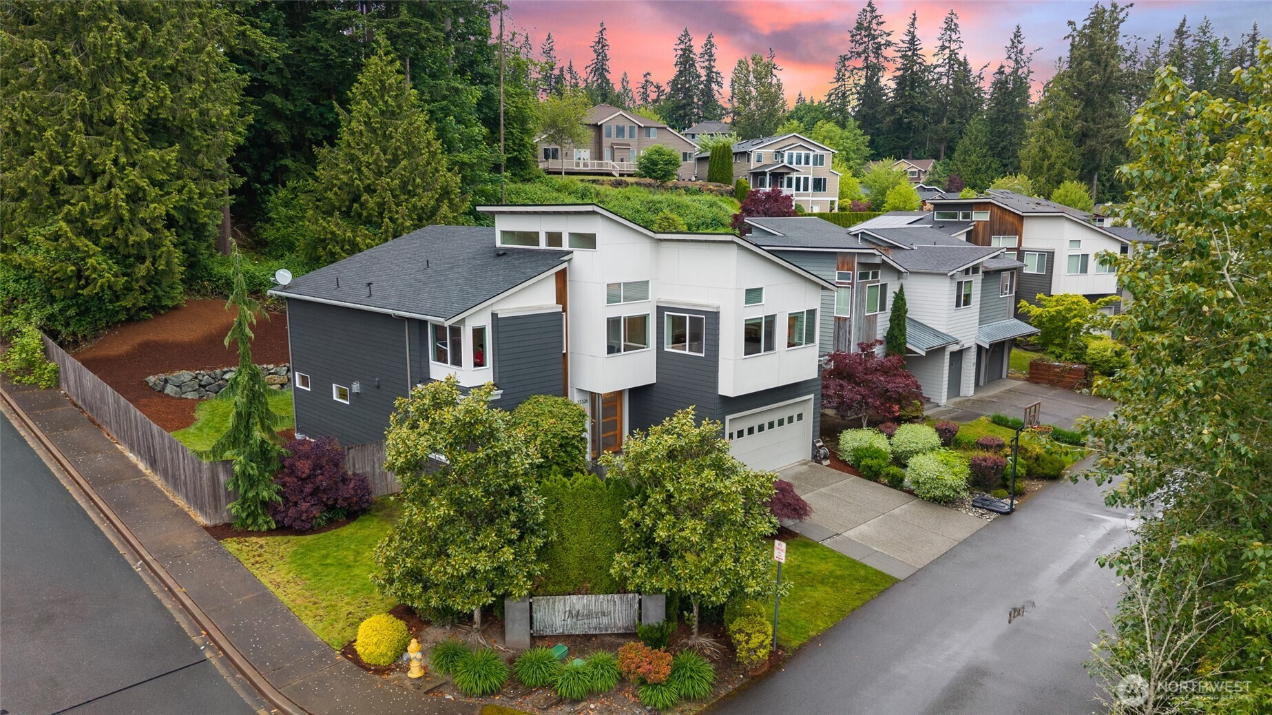 22326 2nd Place Southeast Bothell, WA 98021 - Photo 37 of 40 a view of a white house with a big yard plants and large trees