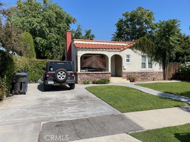 4251 Mccray Street Riverside, CA 92506 - Photo 1 of 1 a view of a house with a garden