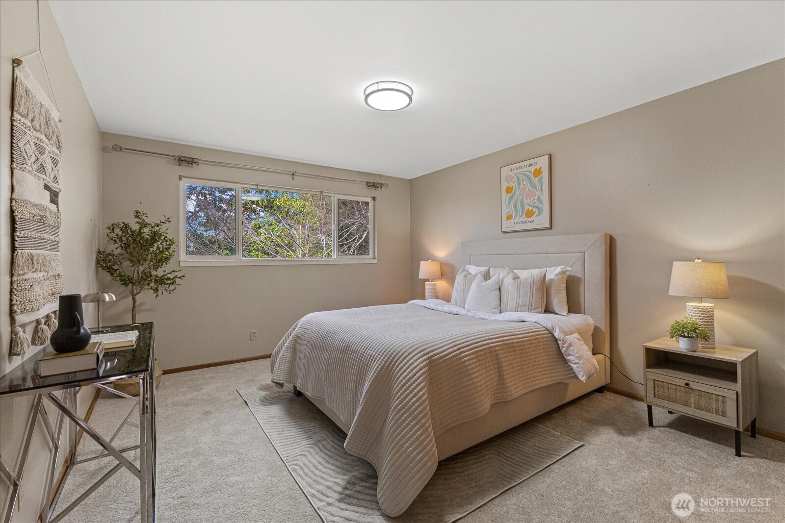 6520 Northeast 60th Street Seattle, WA 98115 - Photo 22 of 40 a bedroom with a bed and a couch
