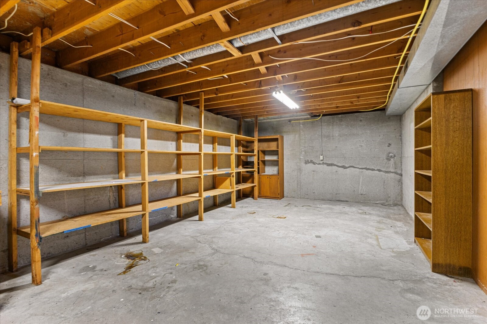 6520 Northeast 60th Street Seattle, WA 98115 - Photo 29 of 40 a view of an empty room with a garage