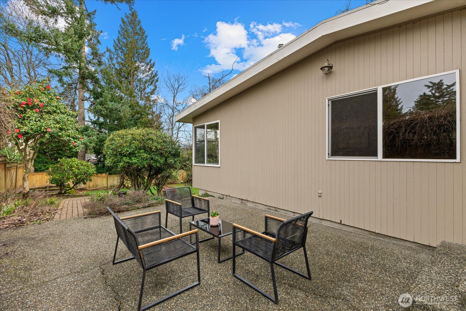 6520 Northeast 60th Street Seattle, WA 98115 - Photo 35 of 40 a view of a house with backyard and sitting area