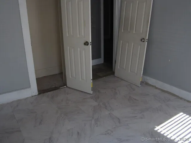 a view of a room with windows