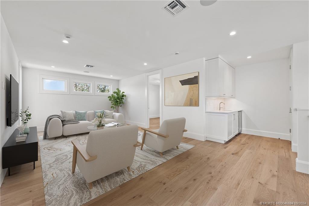 180 Beacon Lane Jupiter, FL 33469 - Photo 32 of 63 a living room with furniture