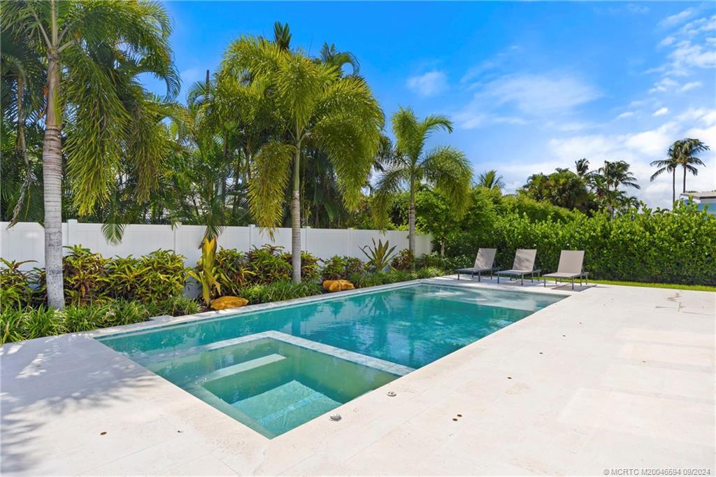 180 Beacon Lane Jupiter, FL 33469 - Photo 55 of 63 a view of a backyard