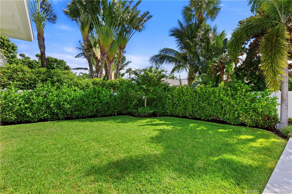 180 Beacon Lane Jupiter, FL 33469 - Photo 59 of 63 a view of a garden