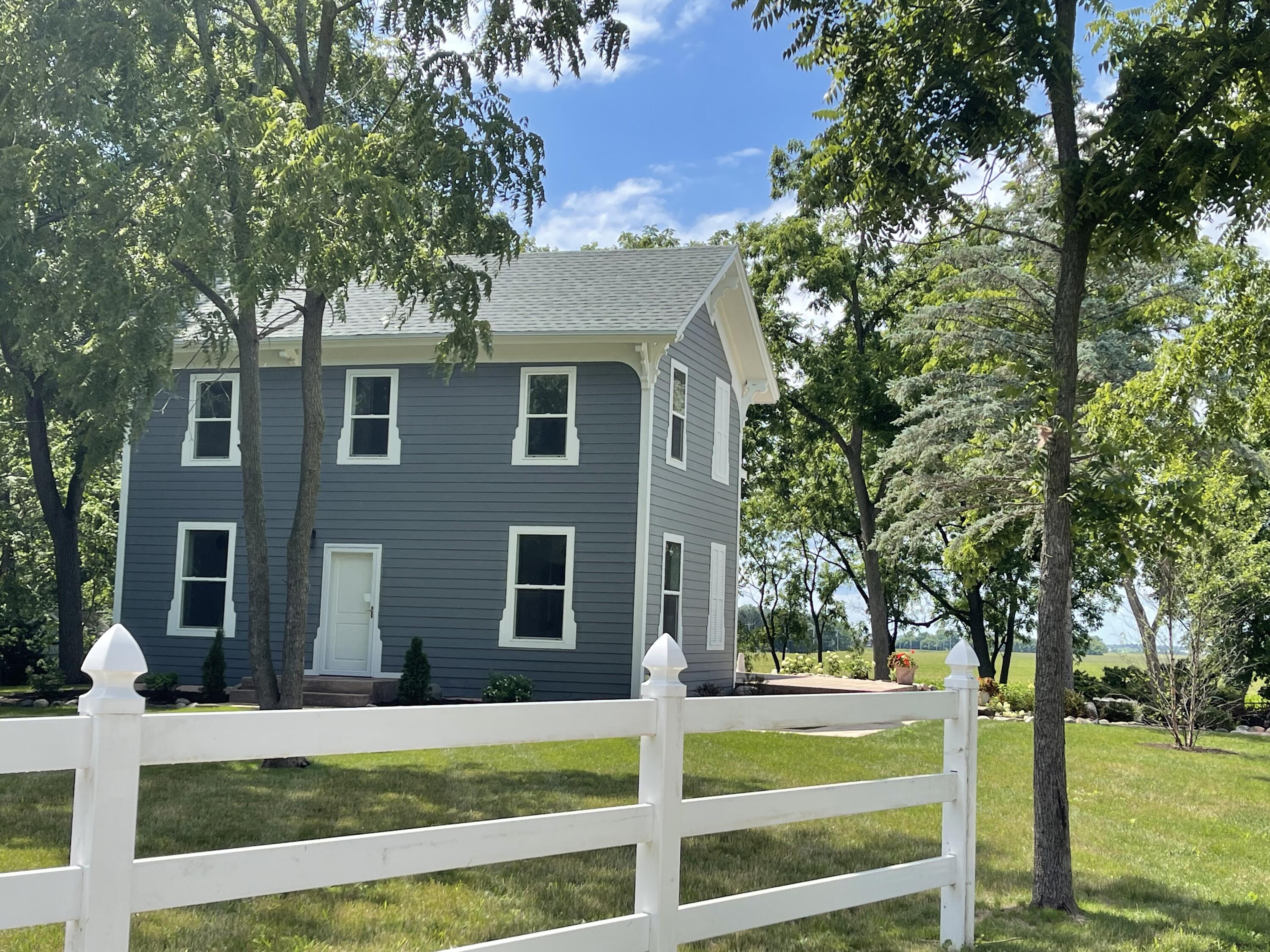 Front of home with drive