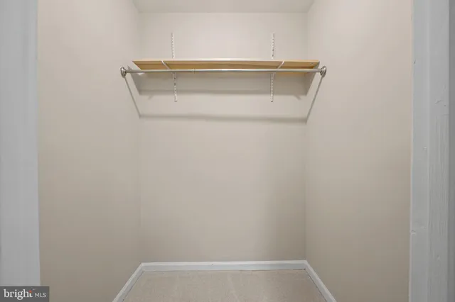 a view of a deck with a table and chairs