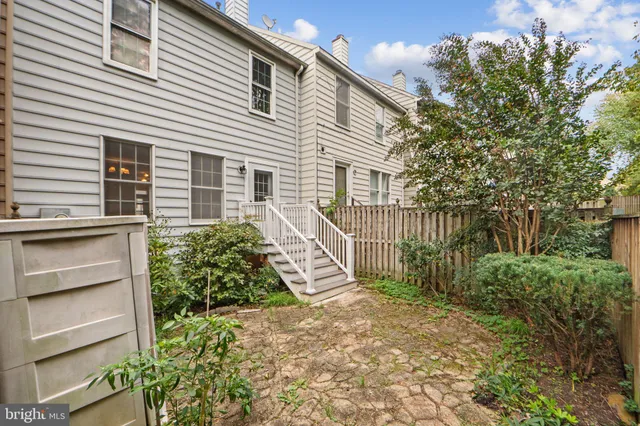 a picture of a bathroom with a shower