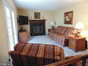 1942 East Beech Road Sterling, VA 20164 - Photo 12 of 25 Wood burning fireplace in the cozy family room