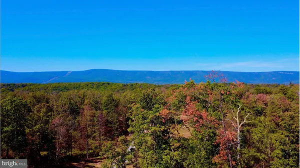 a view of an outdoor space with mountain view