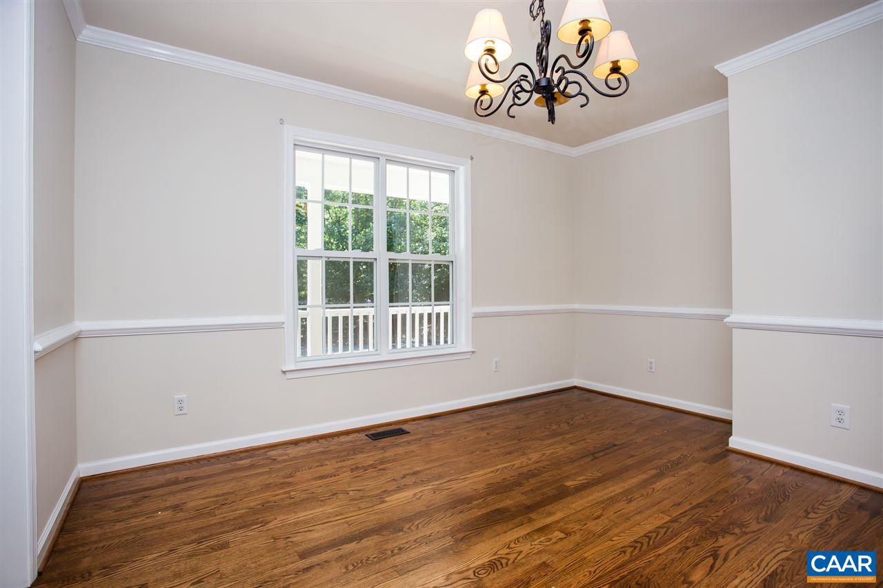 391 Rudolph Street Ruckersville, VA 22968 - Photo 11 of 31 a view of an empty room with a window and a chandelier