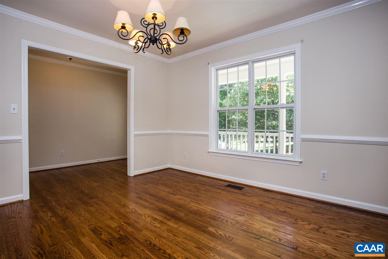 391 Rudolph Street Ruckersville, VA 22968 - Photo 17 of 31 a view of an empty room with a window and wooden floor
