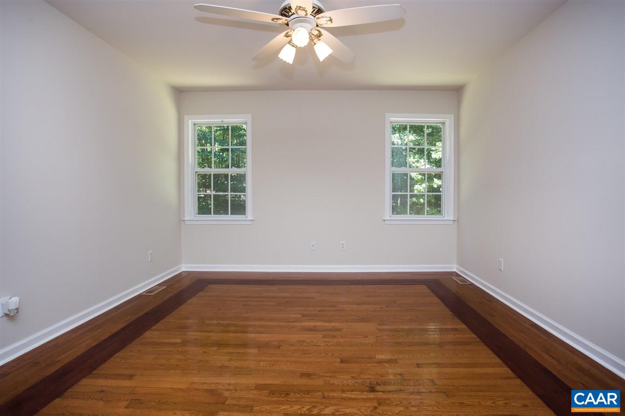 391 Rudolph Street Ruckersville, VA 22968 - Photo 18 of 31 wooden floor in an empty room with a window