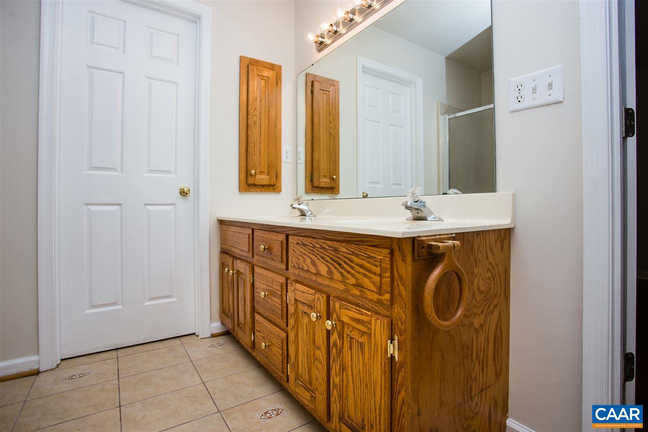 391 Rudolph Street Ruckersville, VA 22968 - Photo 21 of 31 a utility room with cabinets