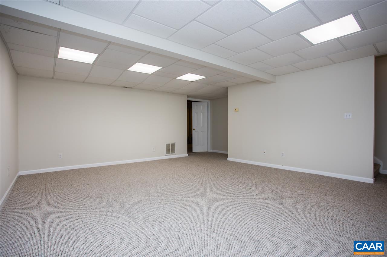 391 Rudolph Street Ruckersville, VA 22968 - Photo 26 of 31 an empty room with an entryway