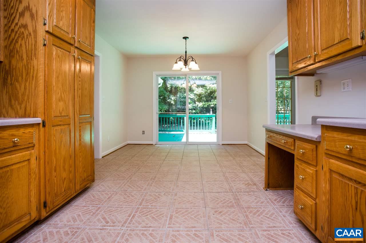 391 Rudolph Street Ruckersville, VA 22968 - Photo 5 of 31 a view of a kitchen with an entryway and a window