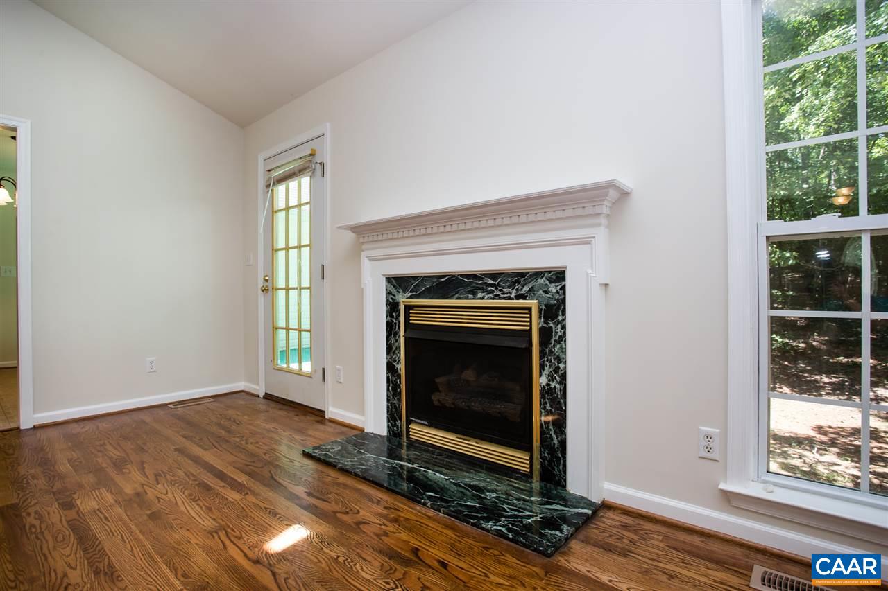 391 Rudolph Street Ruckersville, VA 22968 - Photo 9 of 31 a view of an empty room with wooden floor and a window